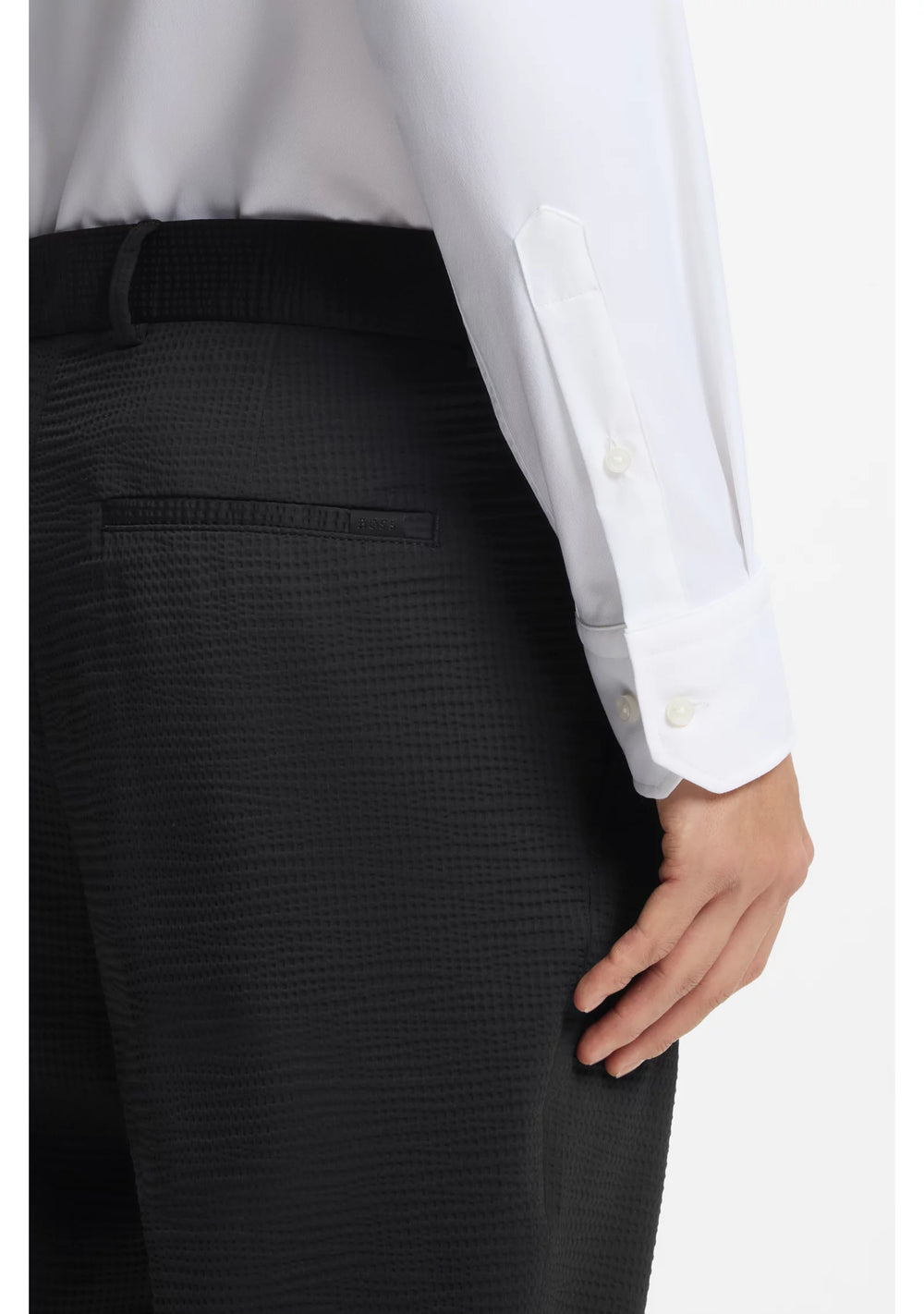 Tapered-fit trousers in stretch seersucker