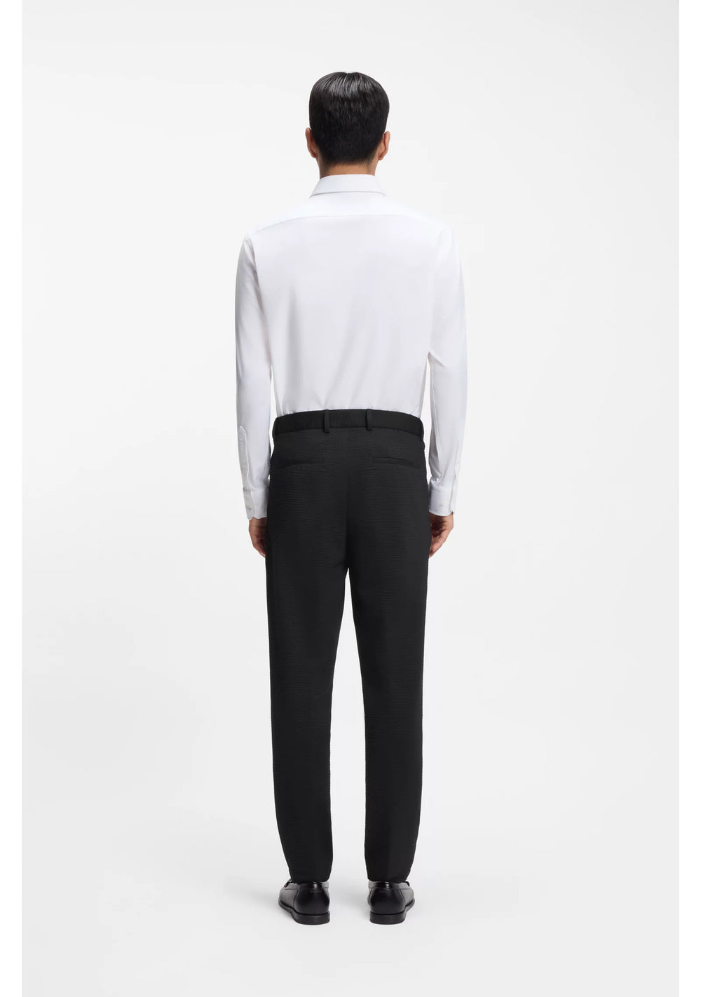 Tapered-fit trousers in stretch seersucker