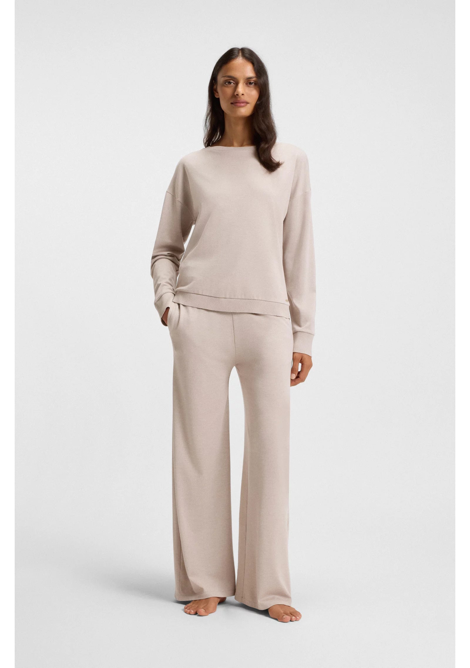 Melange-jersey tracksuit bottoms with logo plate