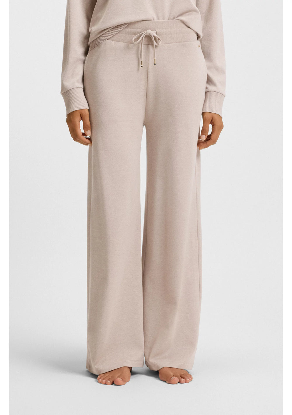 Melange-jersey tracksuit bottoms with logo plate