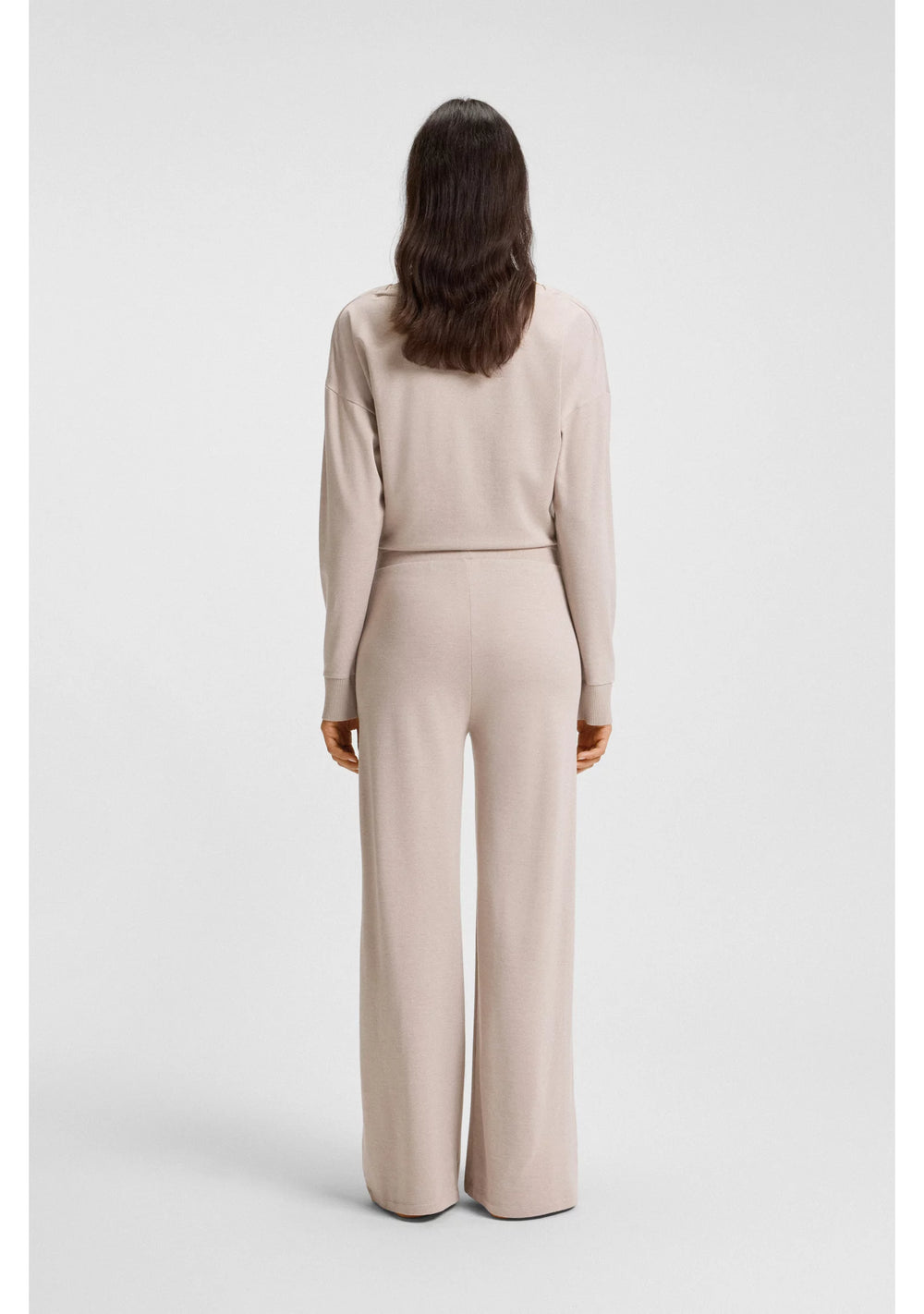 Melange-jersey tracksuit bottoms with logo plate