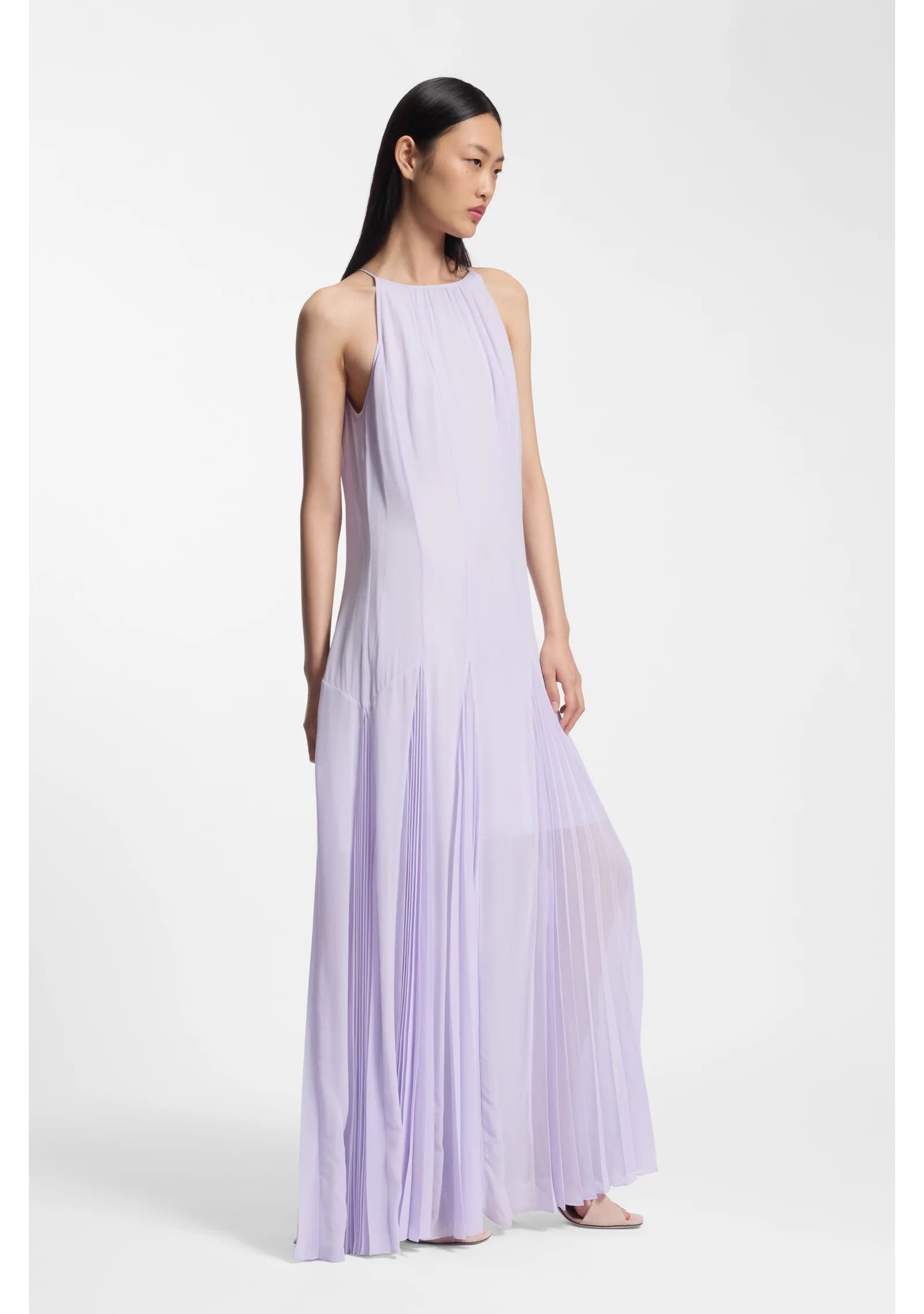 Sleeveless dress with plissé skirt inserts