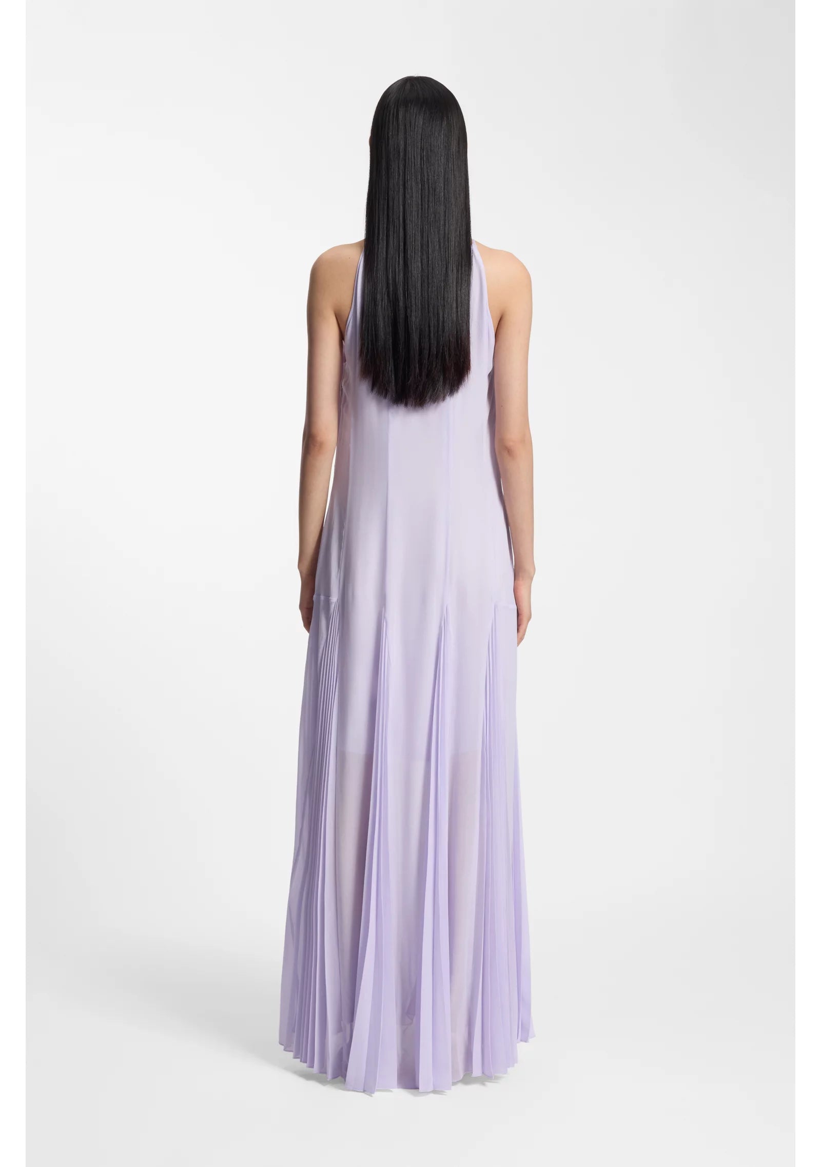 Sleeveless dress with plissé skirt inserts