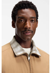 Water-repellent jacket with checked collar