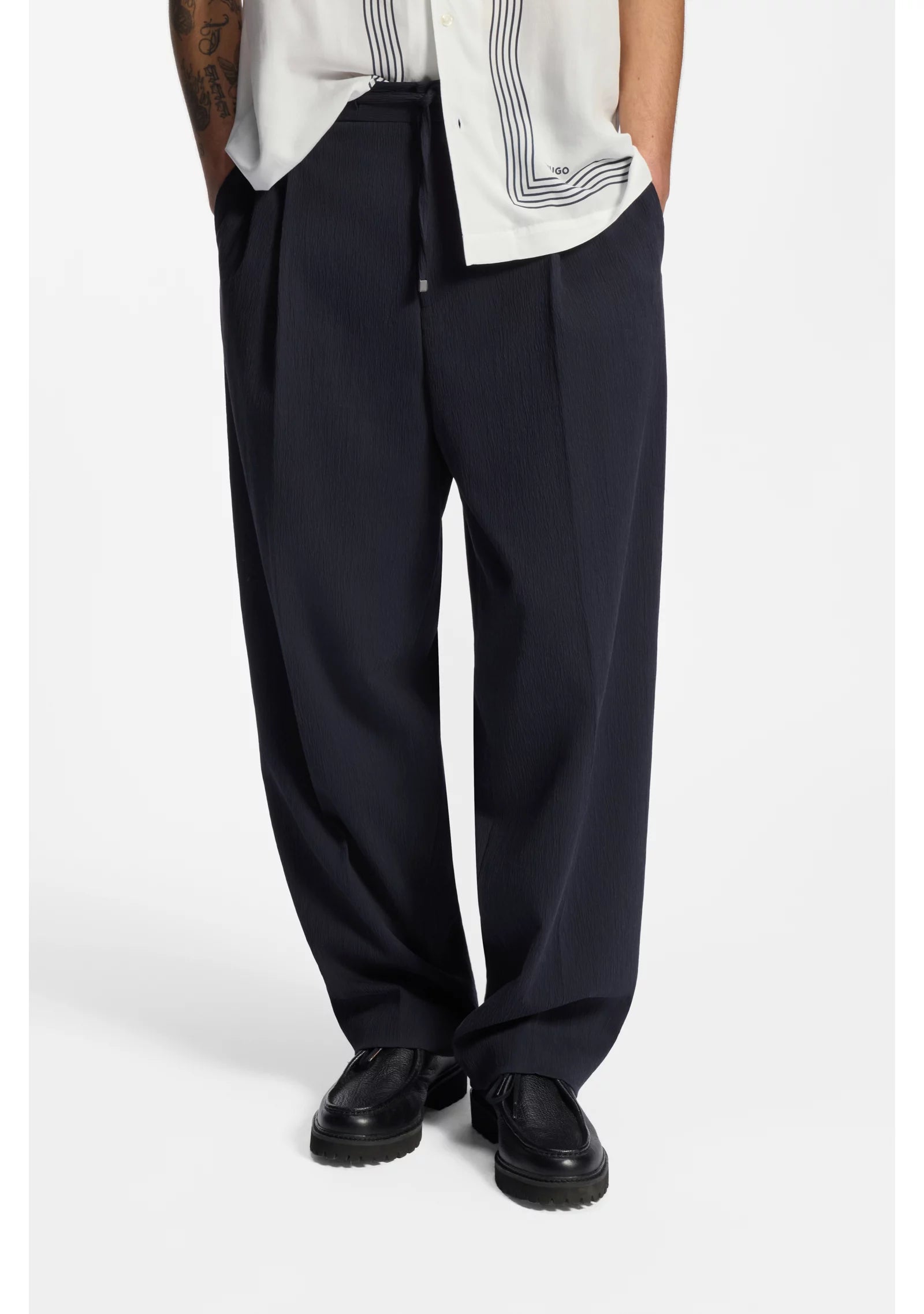 Modern-fit trousers in performance-stretch seersucker