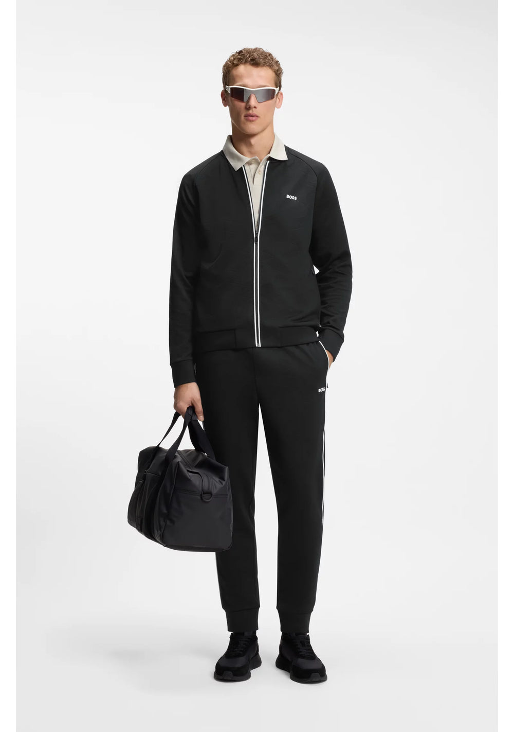 Triangle-jacquard tracksuit bottoms with rubberised logo