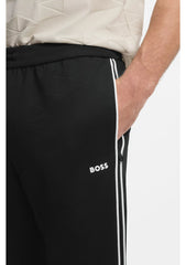 Triangle-jacquard tracksuit bottoms with rubberised logo